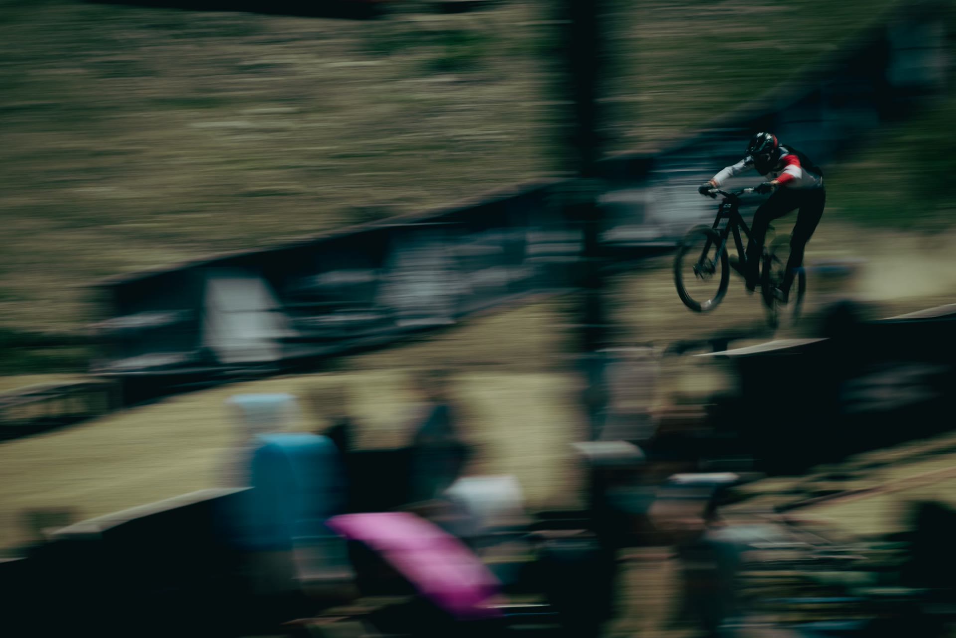 Racer sending a jump over the crowd